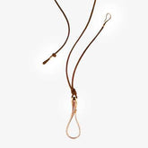 CIONDOLO ELIKA ORO CON CORDINO IN PELLE