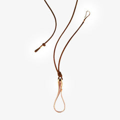 ELIKA GOLD PENDANT WITH LEATHER CORD